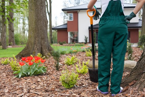 Professional turf fitting work in a compact Kensington courtyard